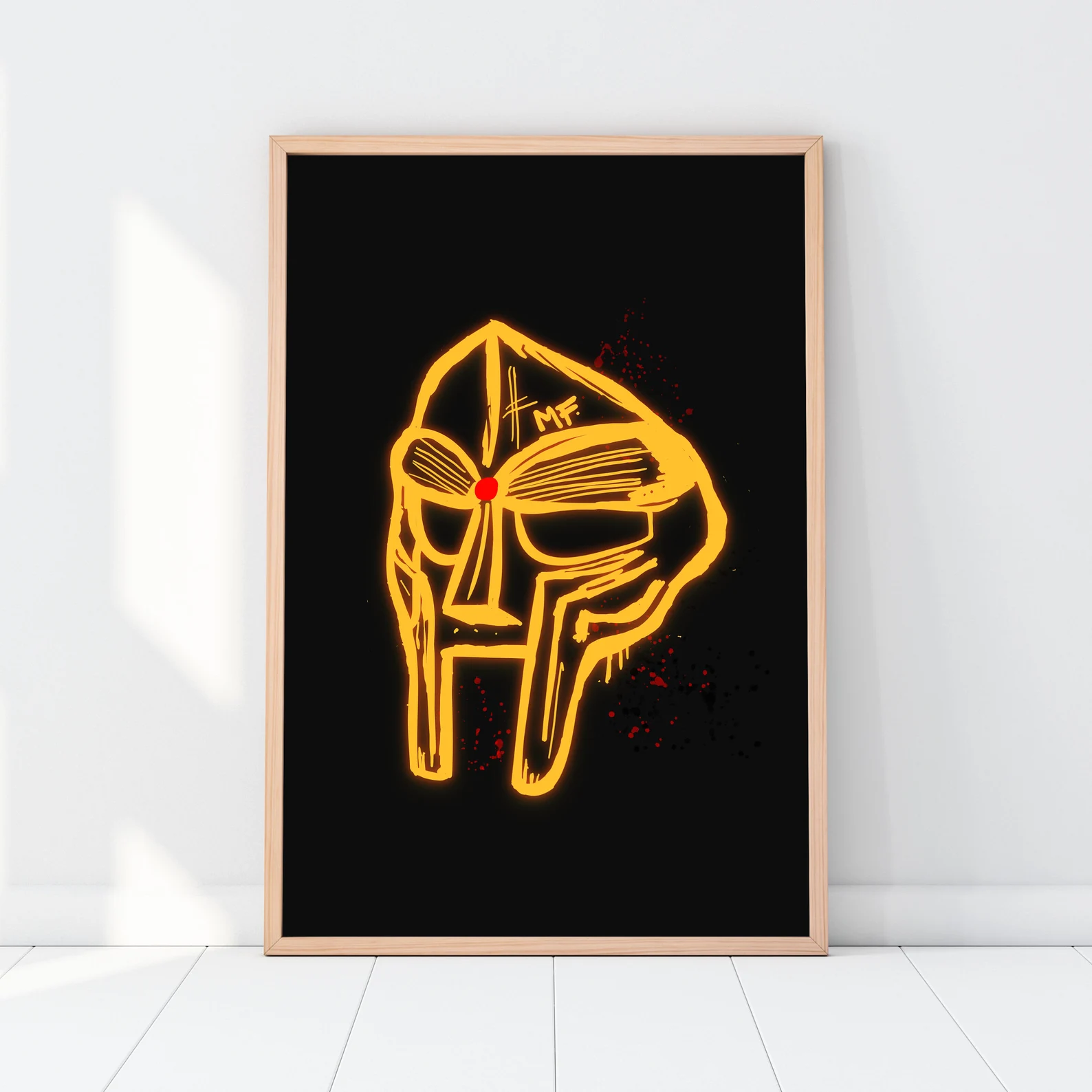 Black MF DOOM poster with yellow glowing mask artwork.