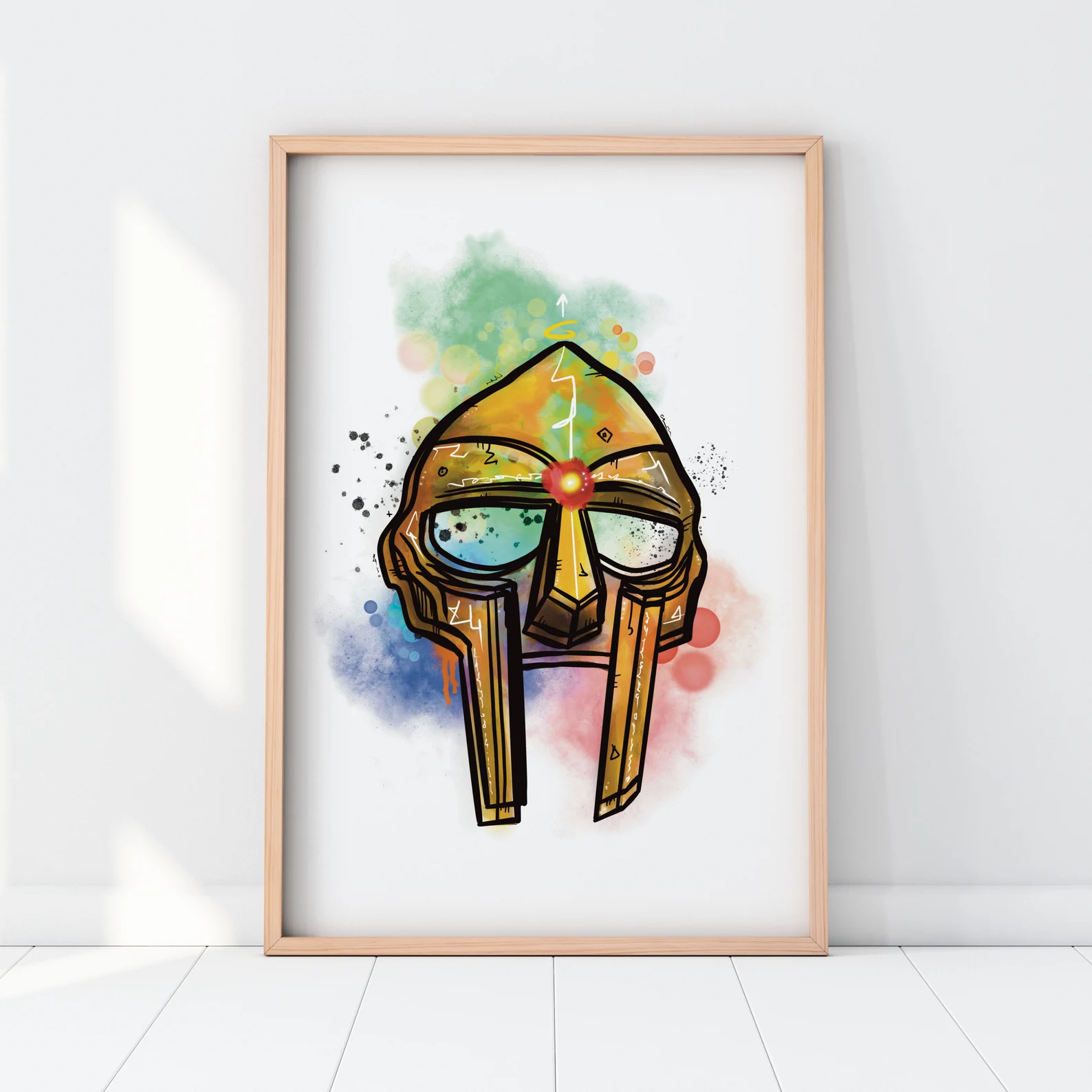 White MF DOOM print with gold mask and soft colour background.