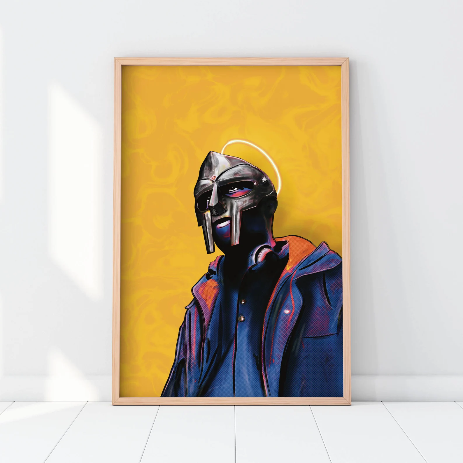 Yellow MF DOOM portrait poster in a wooden frame.